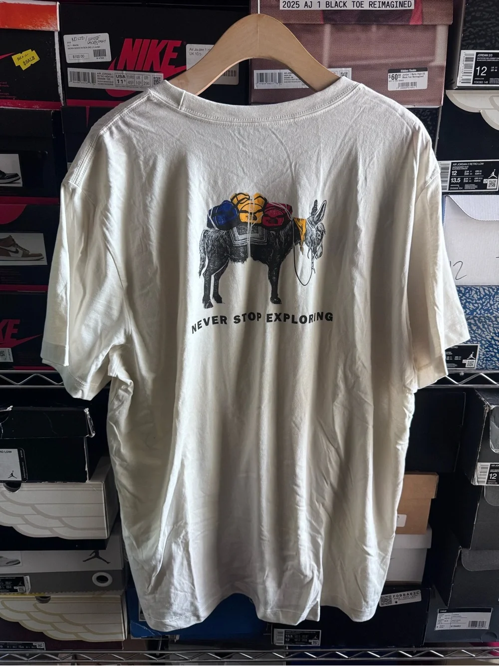 The North Face Cream 'Never Stop Exploring' Donkey Graphic Tee