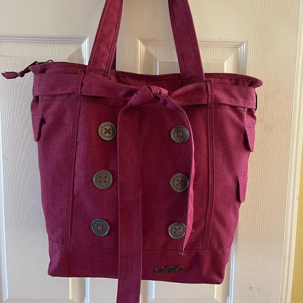 OGIO burgundy canvas large laptop tote with decorative belt fully padded