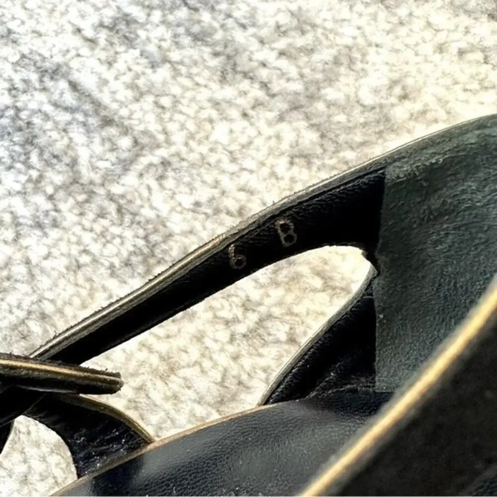 CHANEL black suede