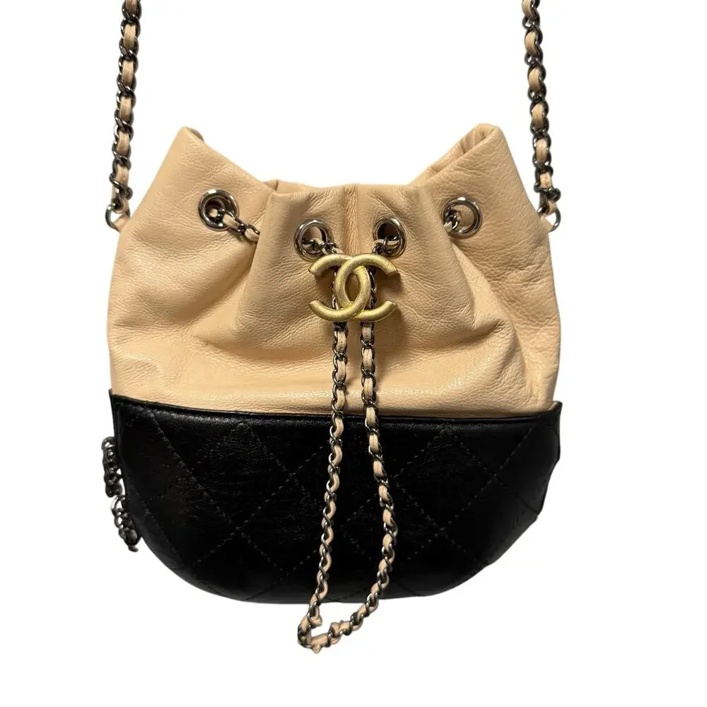 Chanel Gabrielle Bucket Bag Beige Black Quilted Leather CC Logo Chain Link Strap