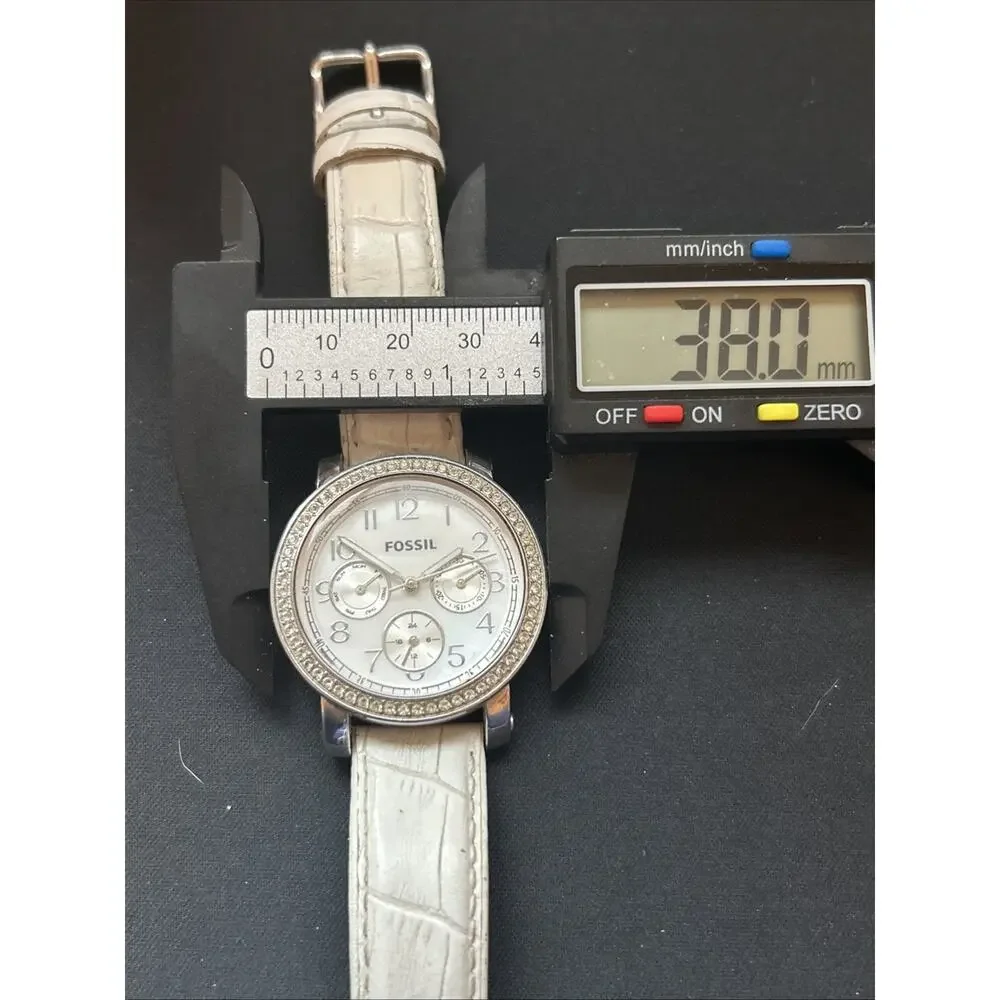 Fossil silver tone