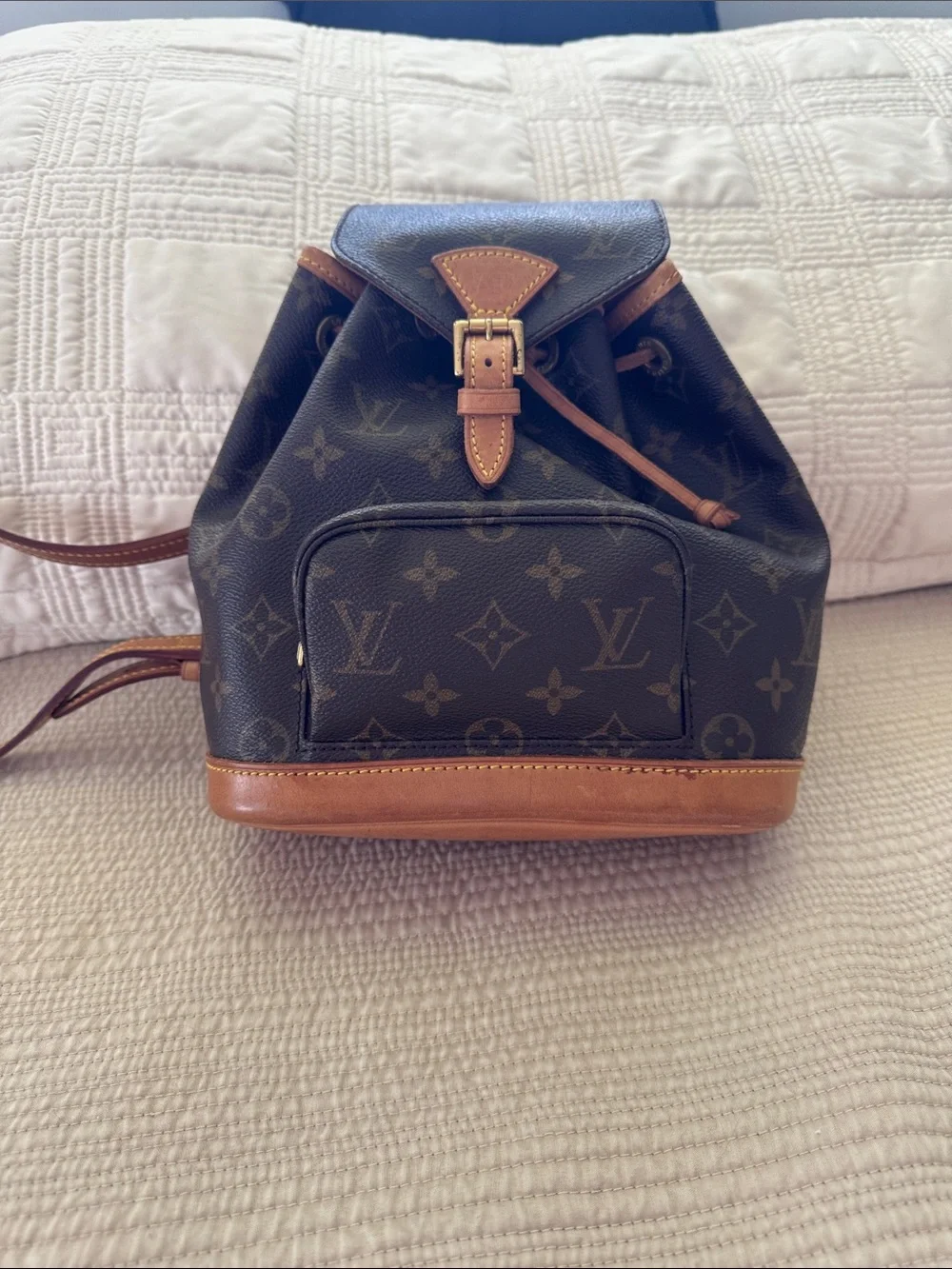 Louis Vuitton Monogram Drawstring Mini Backpack in Brown and Tan Leather Trim