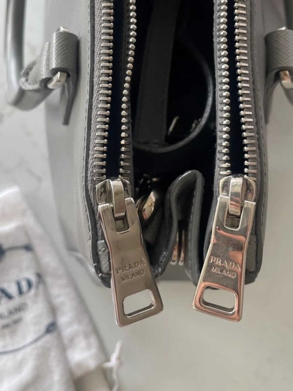 Prada signature polished closure