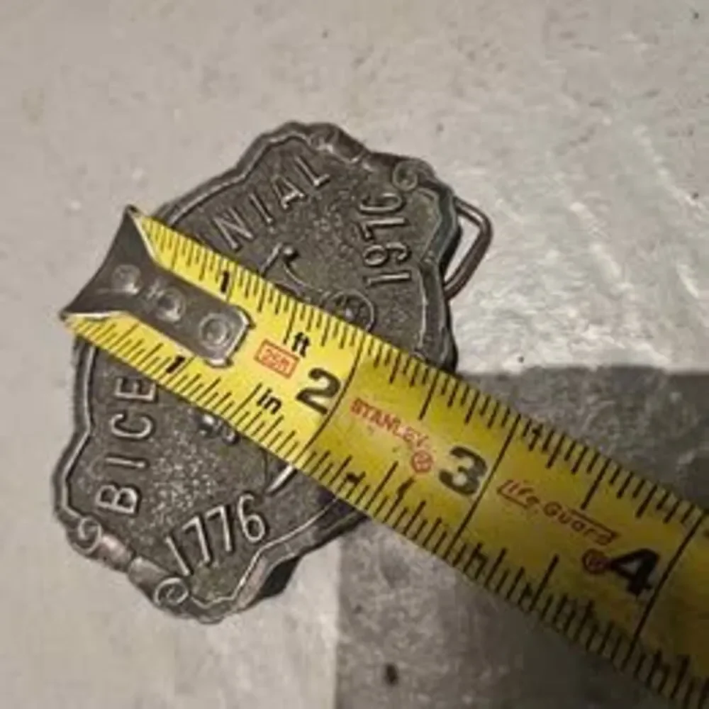Source Unknown belt buckle