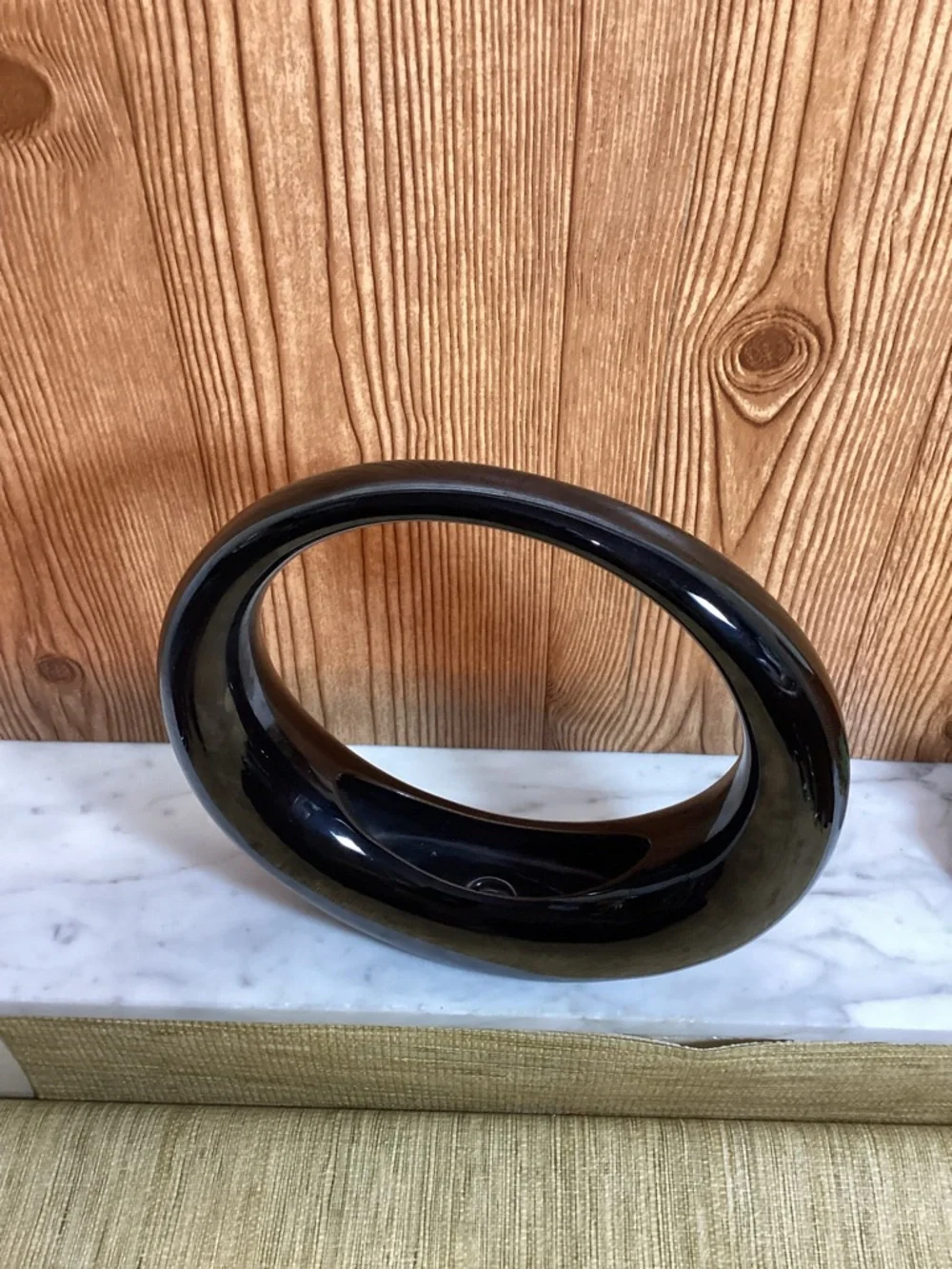 Dolbi Cashier sculptural circular