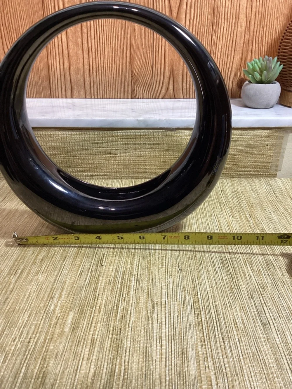 Dolbi Cashier sculptural circular