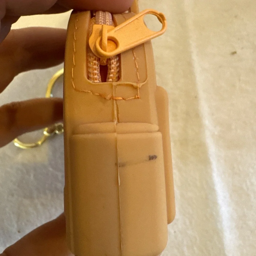The Unbranded Brand silicone zip