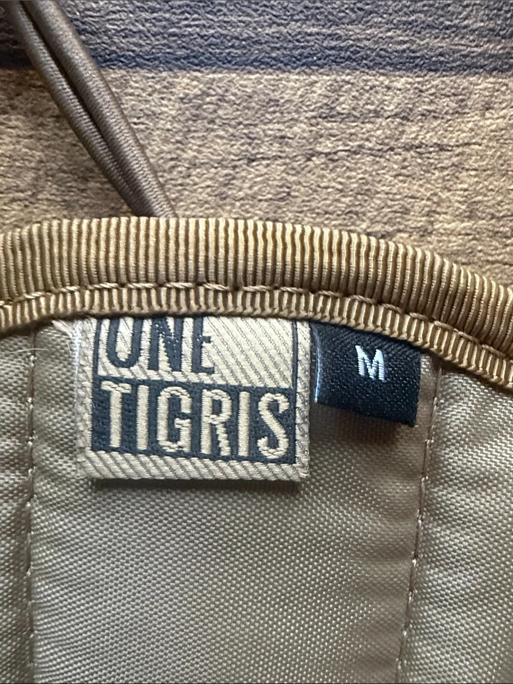 One Tigris size medium