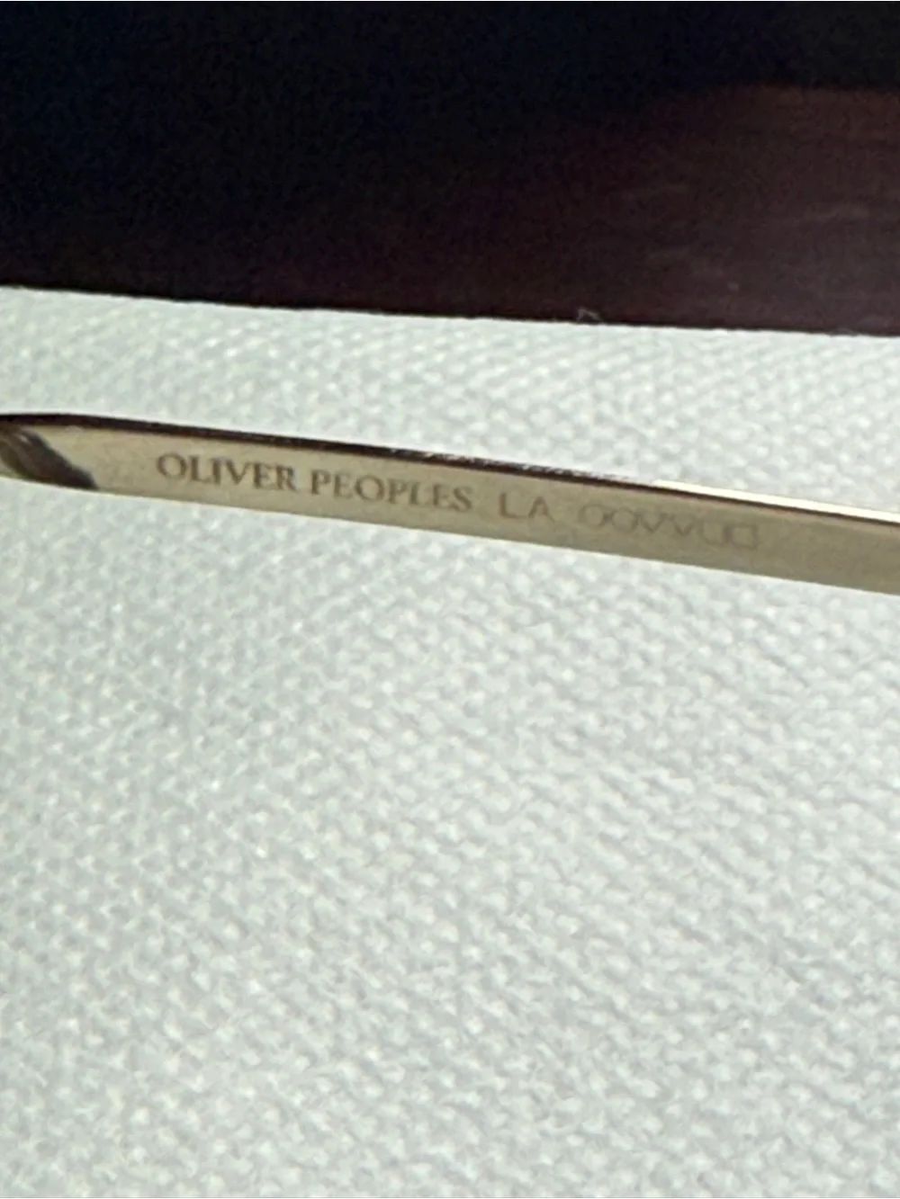 Oliver Peoples under confidence