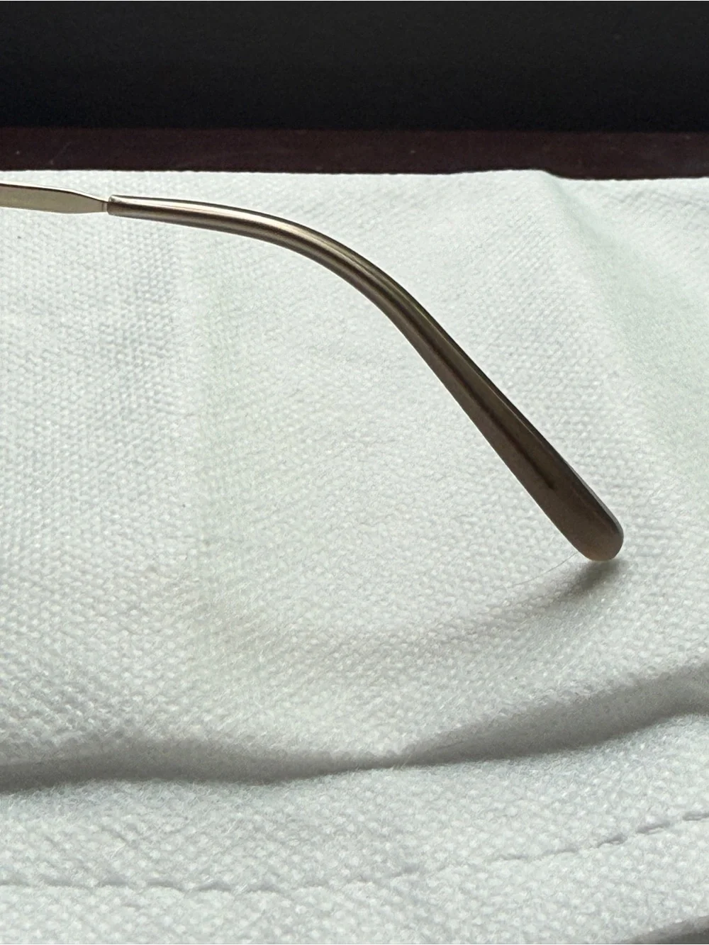Oliver Peoples under lenses open