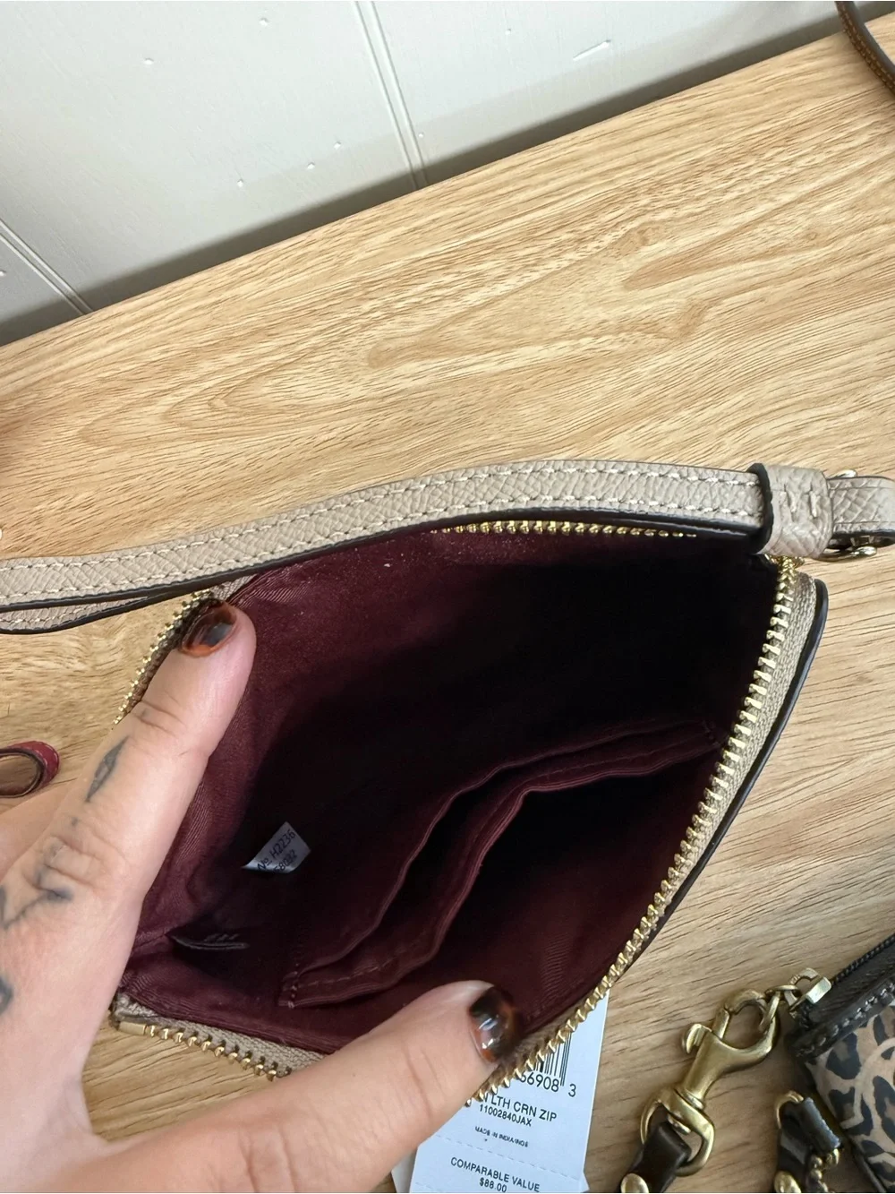 Coach wristlet taupe