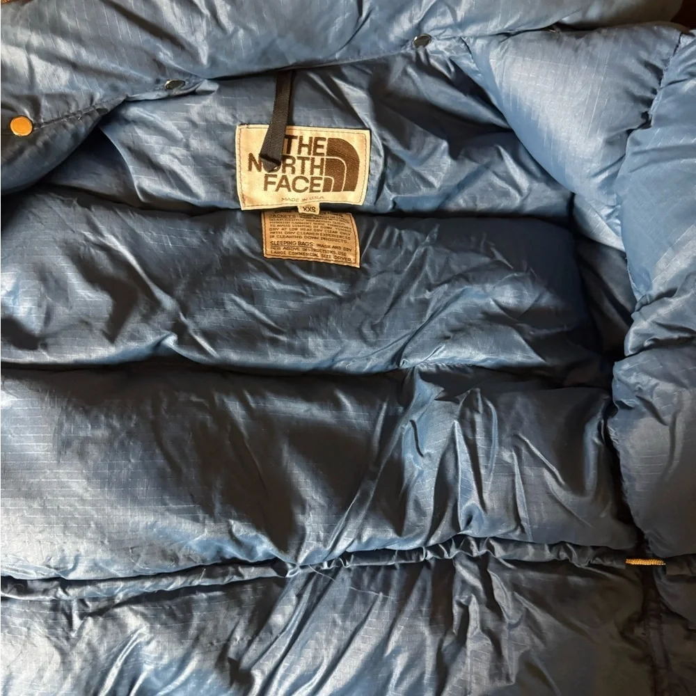 The North Face snap button insulated
