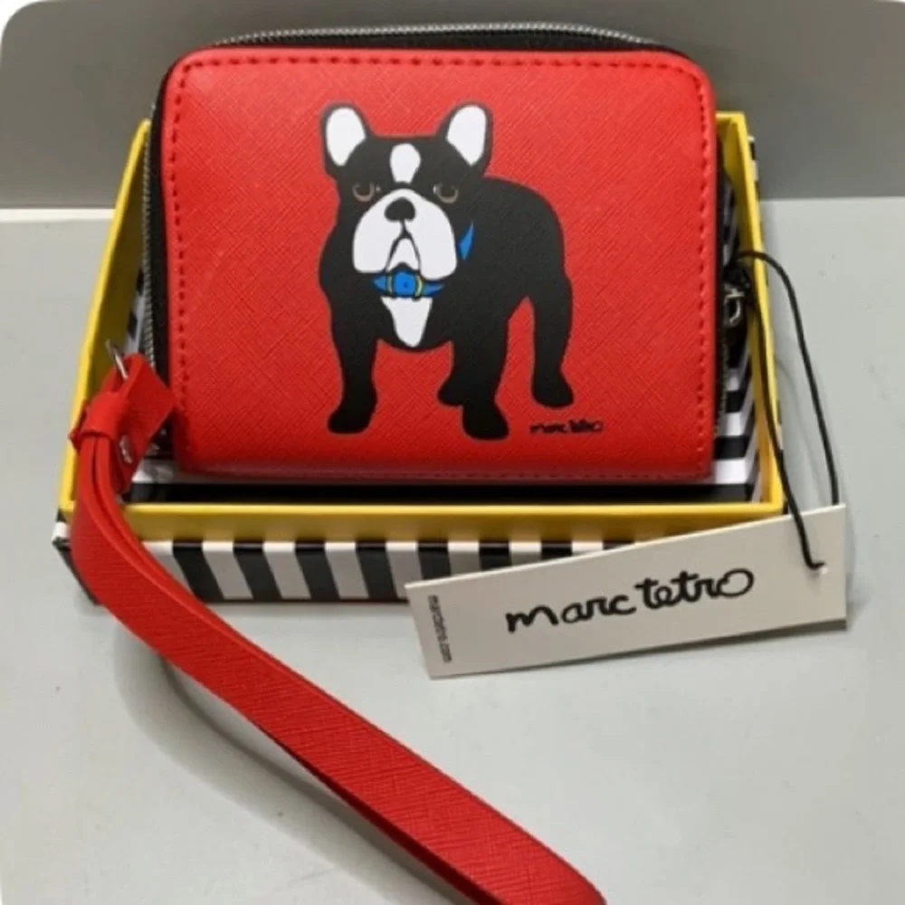 Marc Tetro wristlet includes
