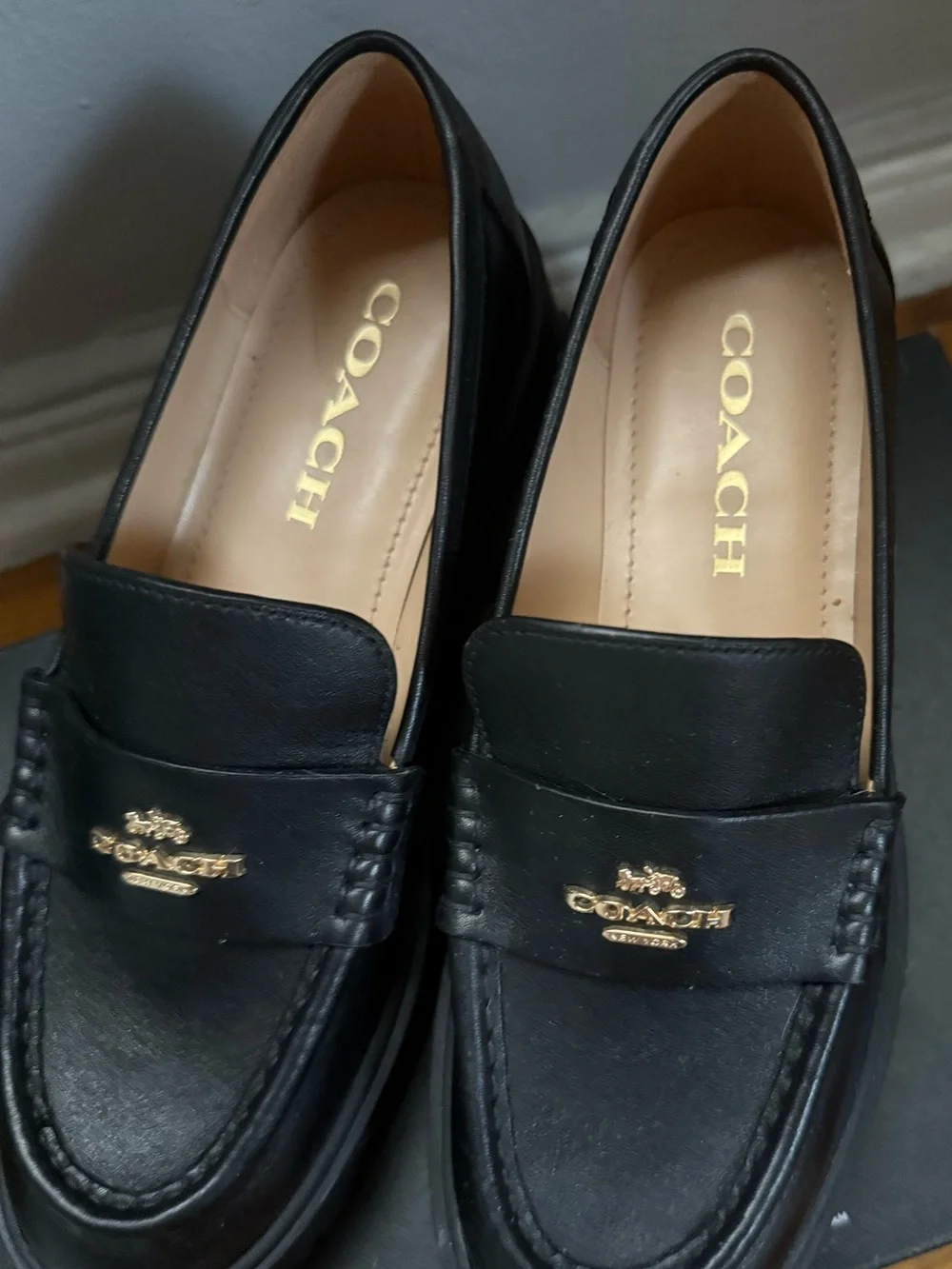 Coach black platform