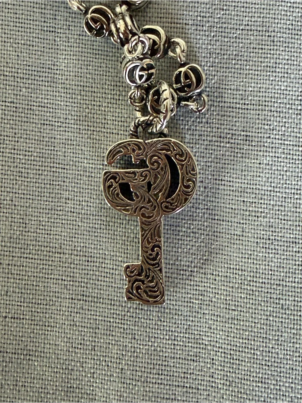 Gucci key pendant