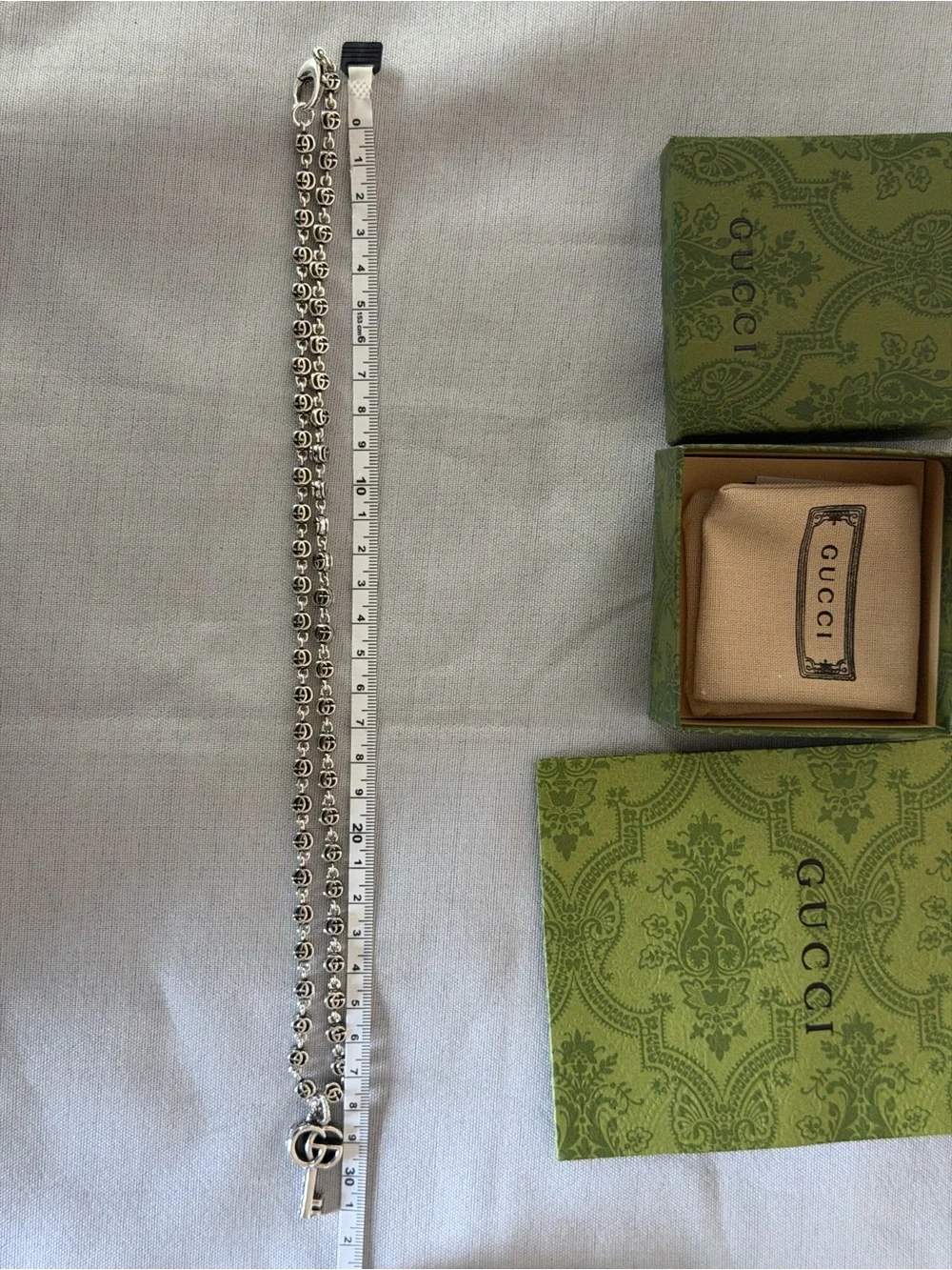Gucci key pendant