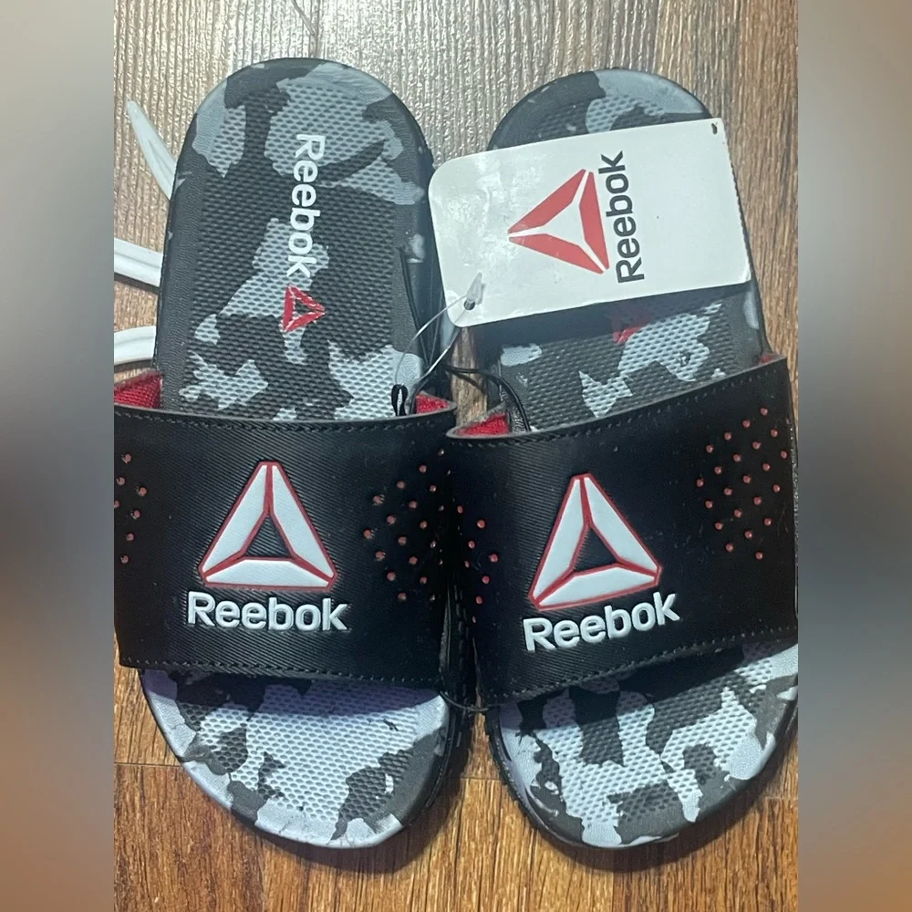Reebok slides featuring
