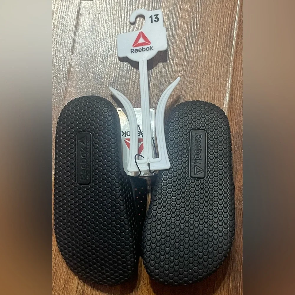 Reebok slides featuring
