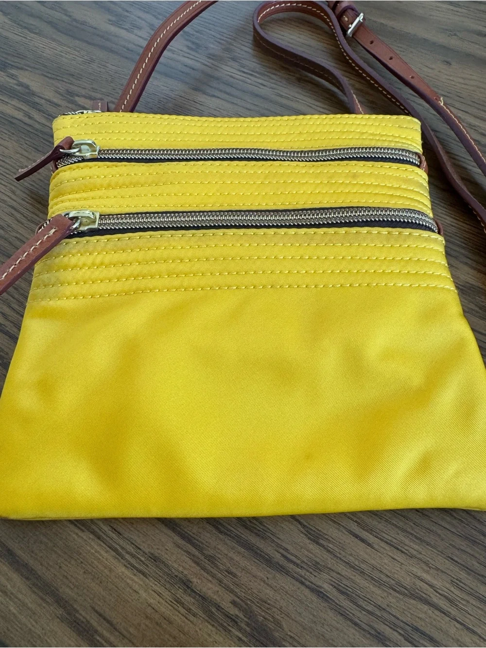 Dooney & Bourke compact yellow