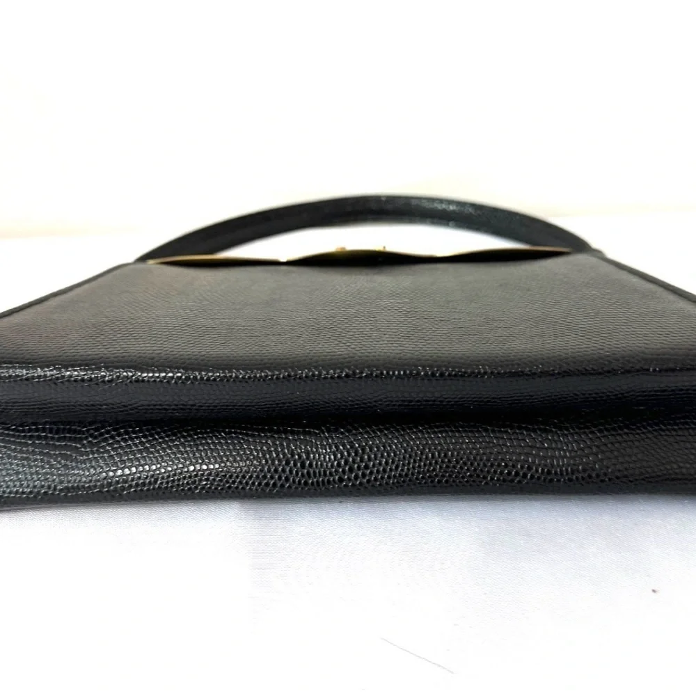 Vintage black embossed