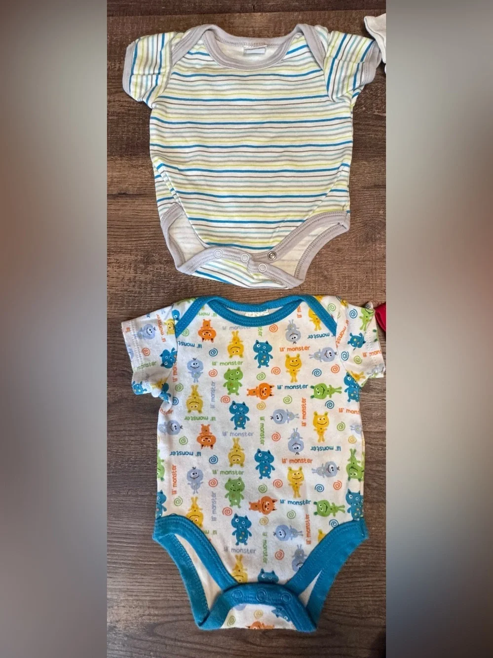 carters®& Calvin Klein infants onesies changes