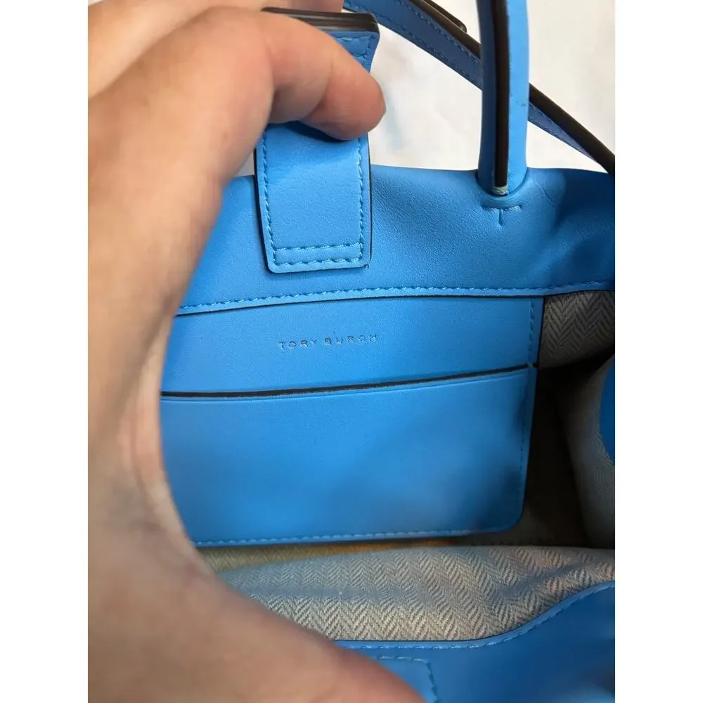 Tory Burch features hardware handbag