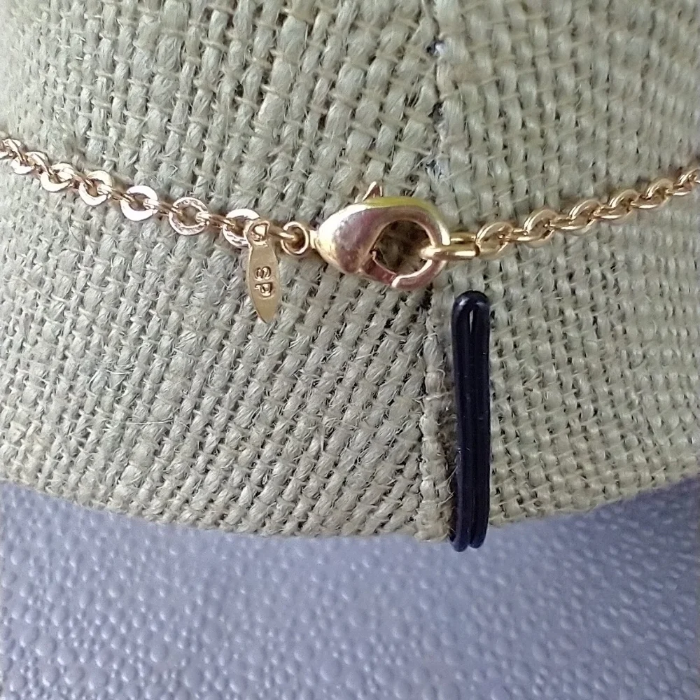 Avon women gold