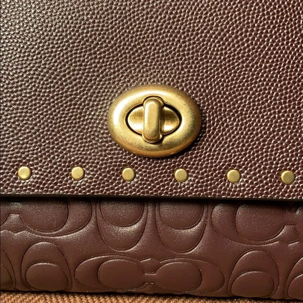 Coach pristine worn as