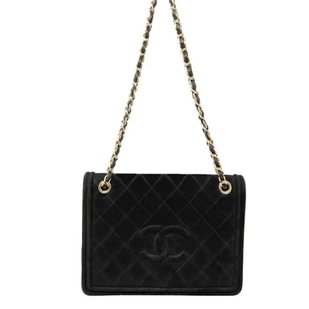 CHANEL black suede