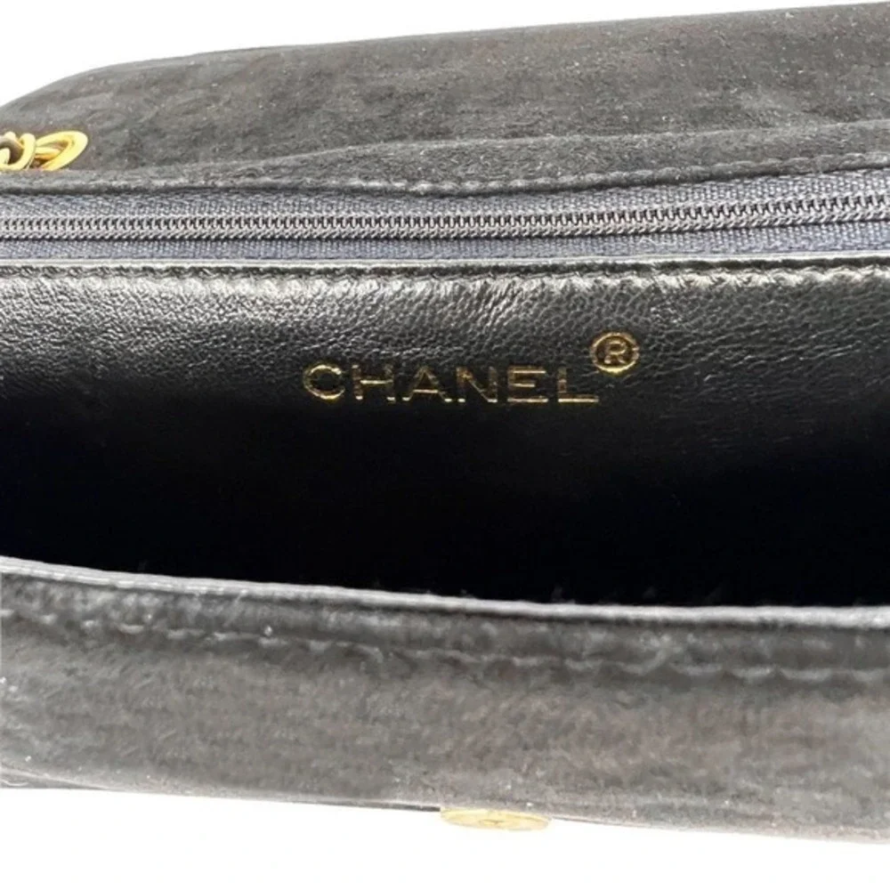 CHANEL black suede
