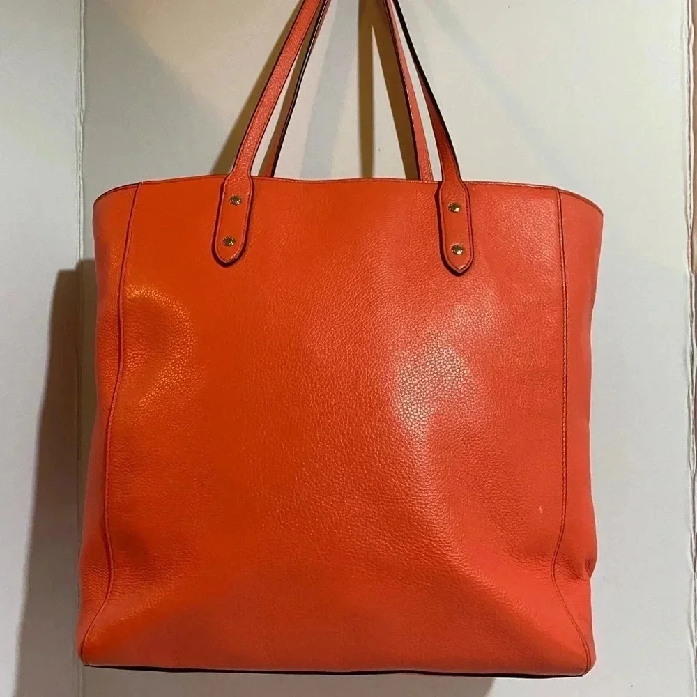 Coach coral leather
