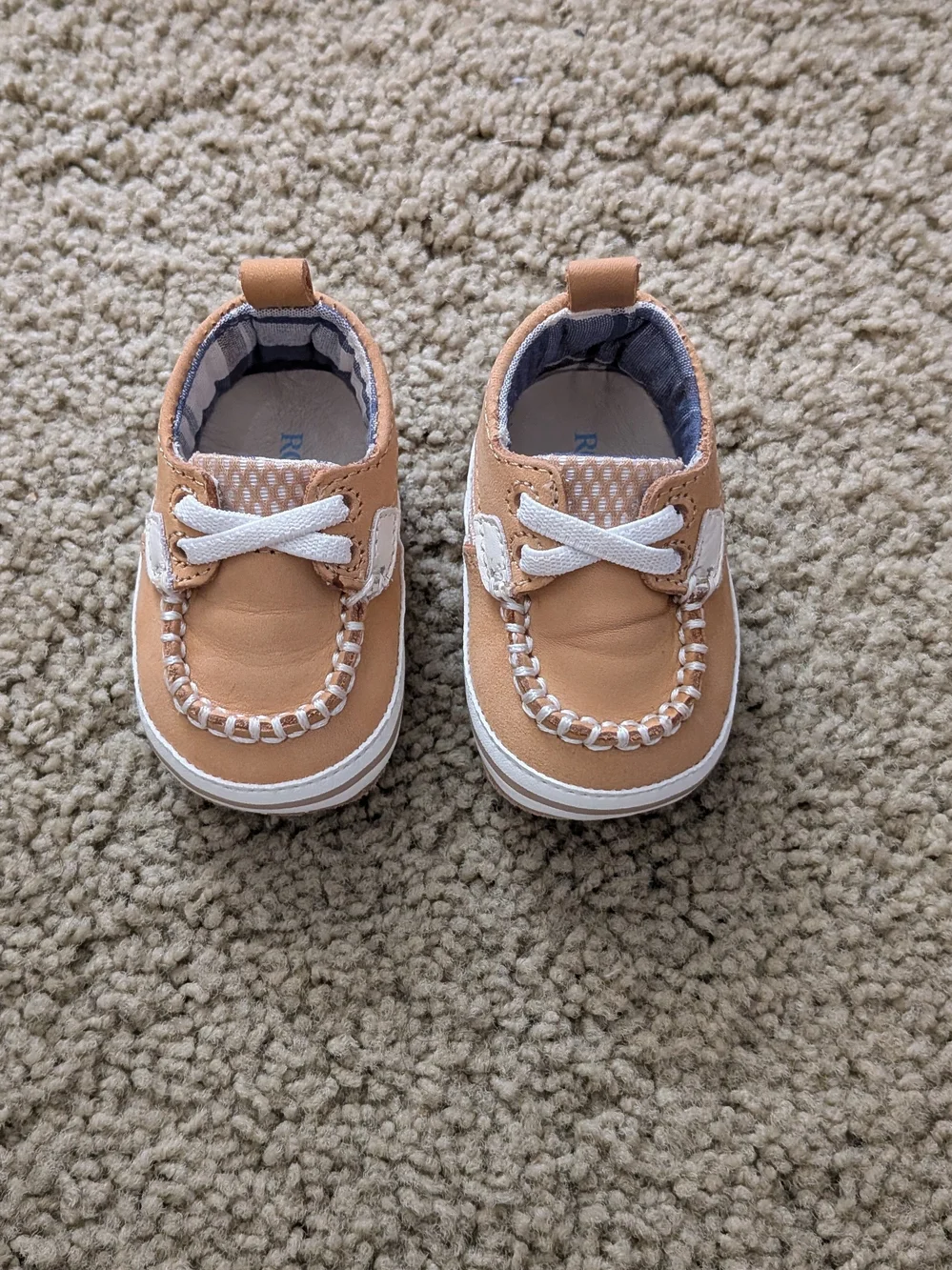 Robeez Tan and White Baby Boat Shoes with Decorative Stitching