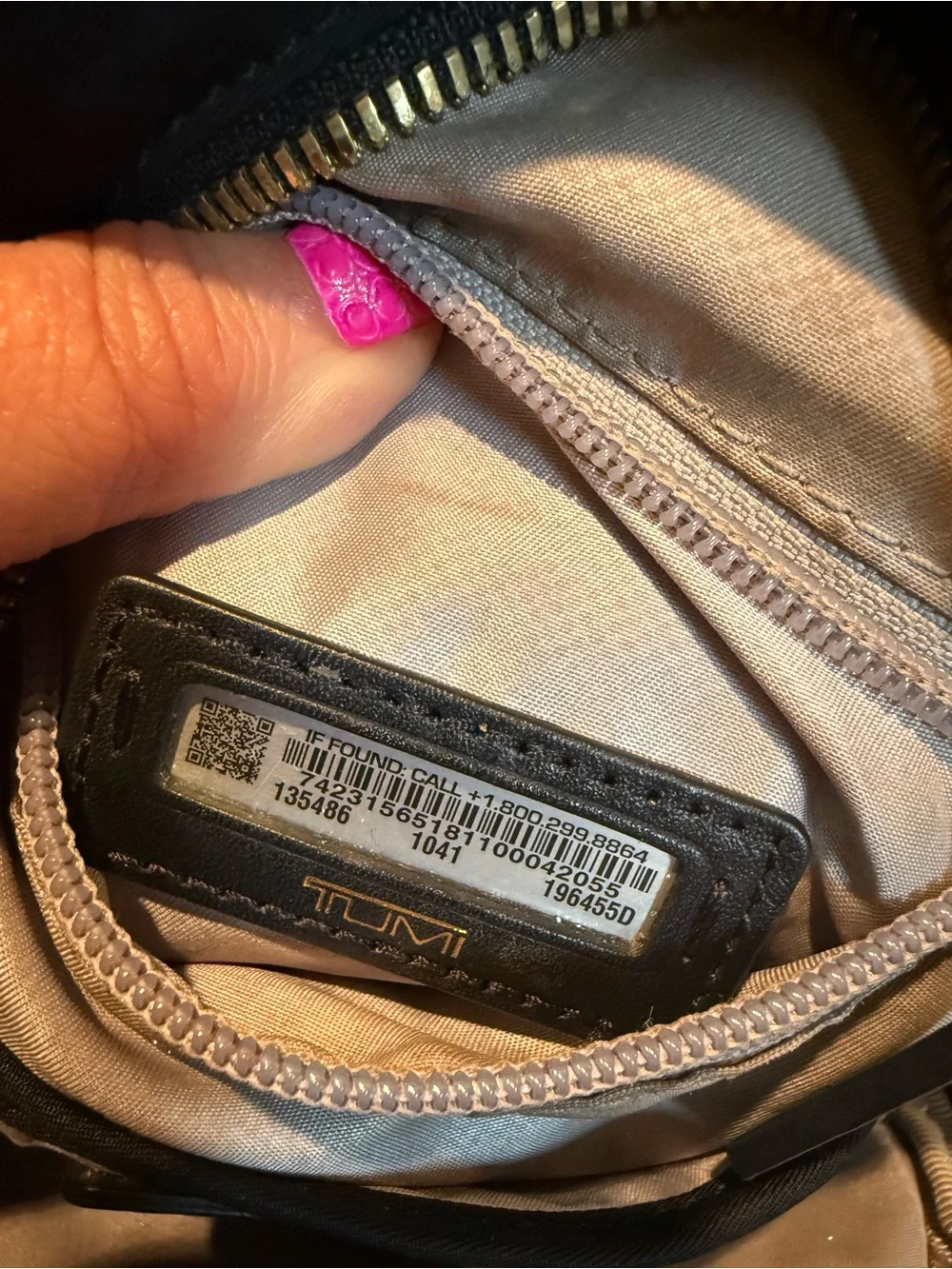 Tumi sling bag