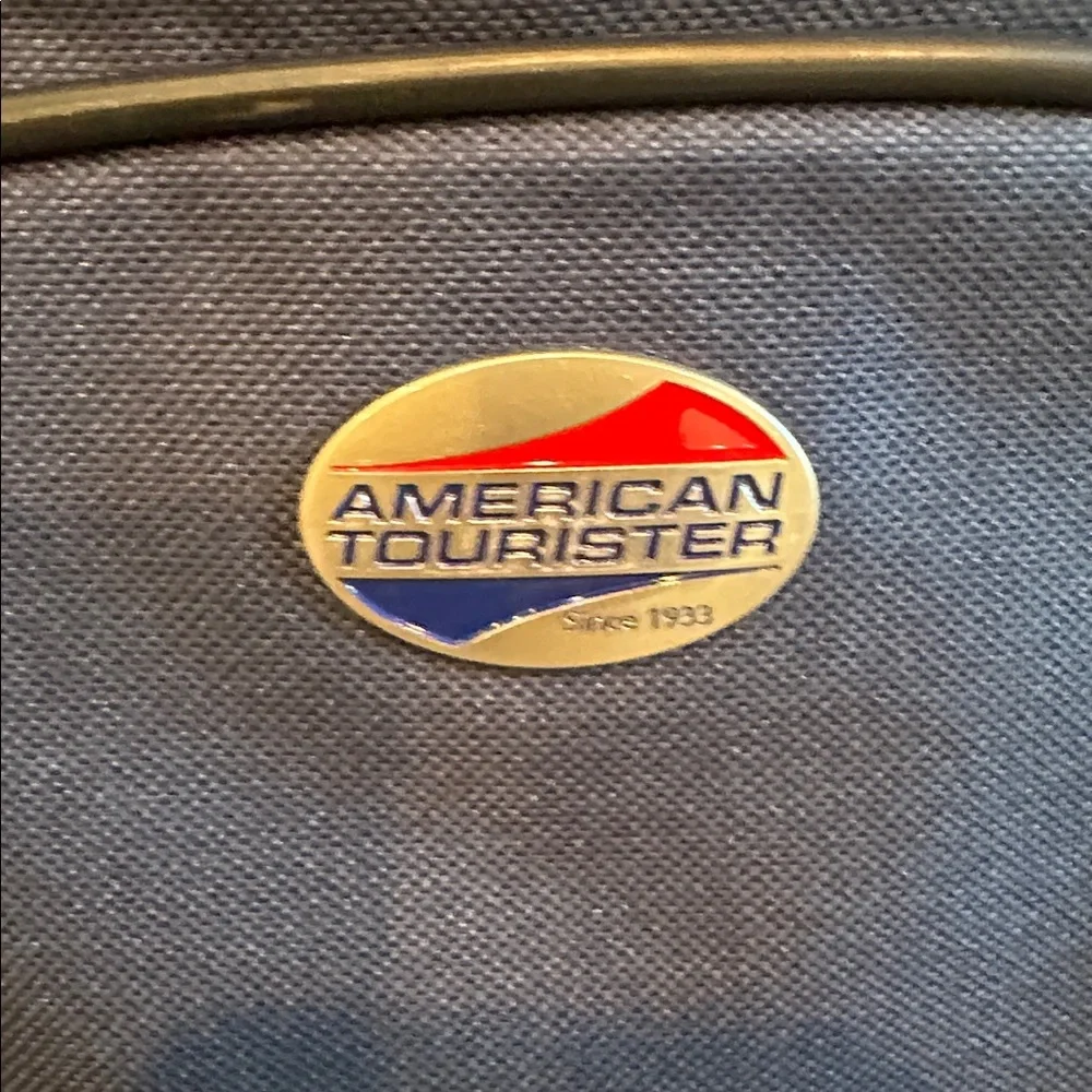 American Tourister compact messenger