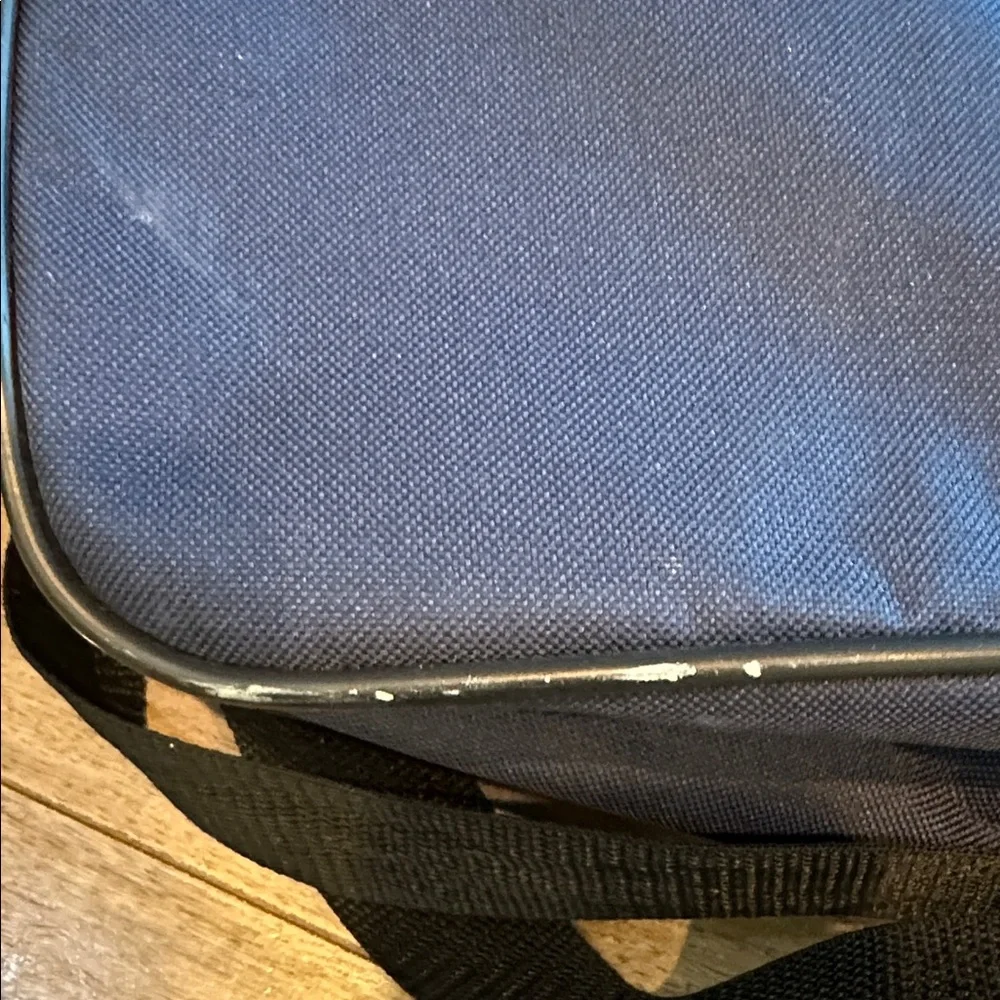 American Tourister compact messenger