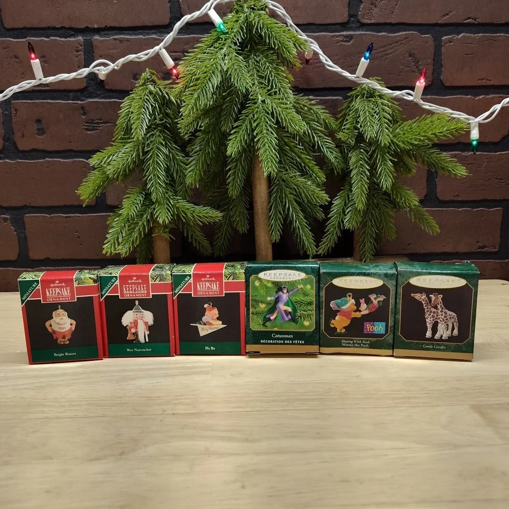 6 Hallmark miniature ornaments lot Catwoman,Pooh, Giraffe,Santa Boxers Etc