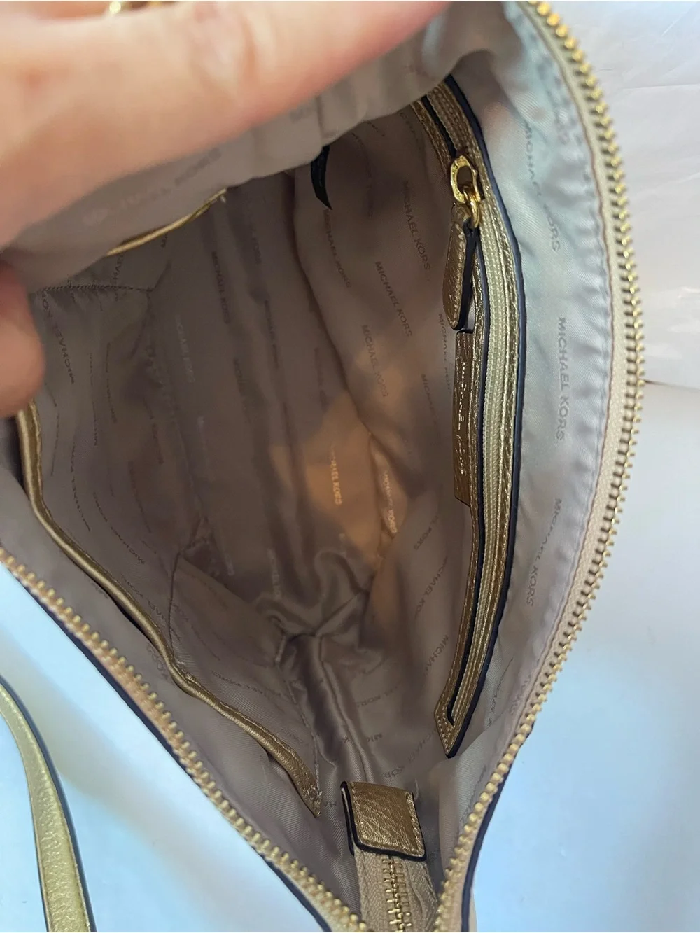 Michael Kors Gold leather hobo crossbody bag.
