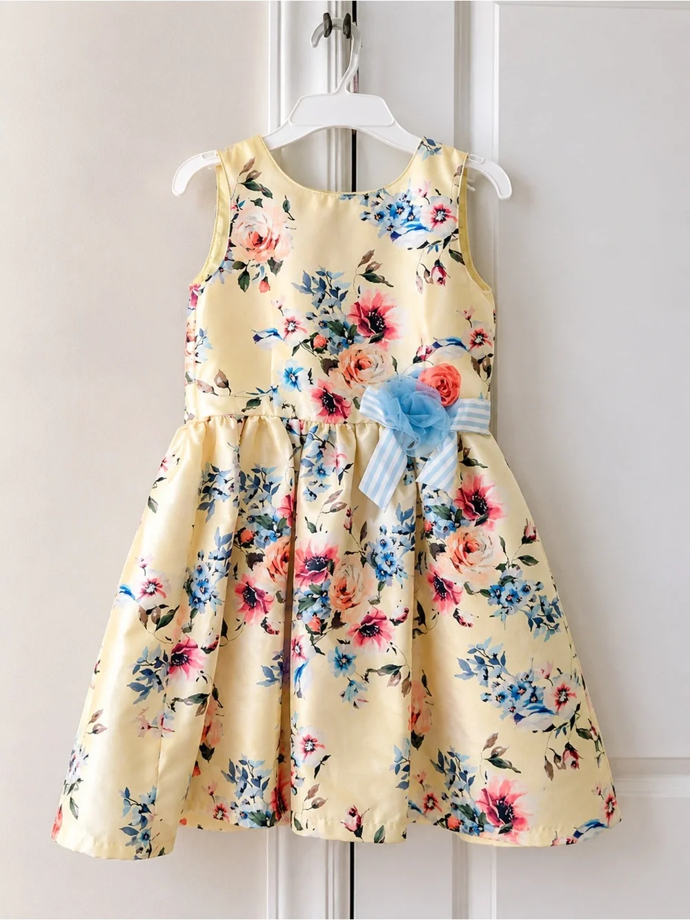 Elegant Pippa & Julie Yellow Floral Dress with Blue Bow Accent