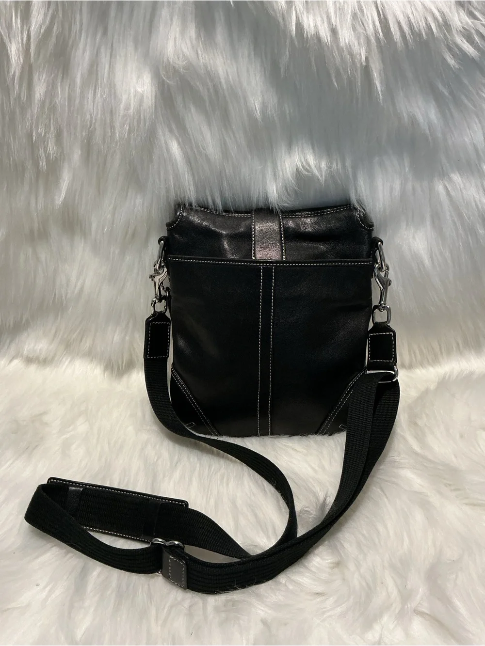 Coach sleek black