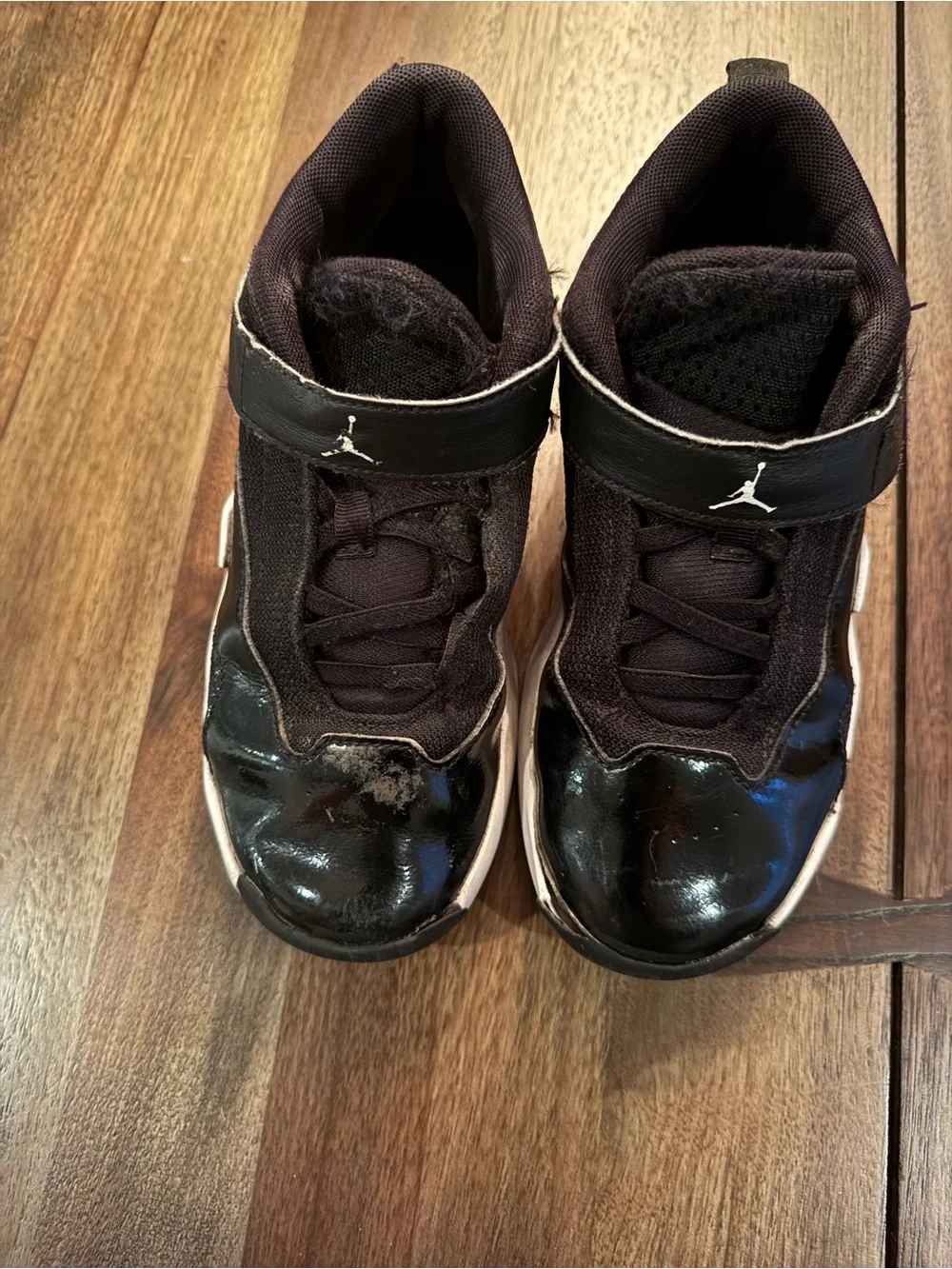 Jordan Kids Black and White High-Top Sneakers