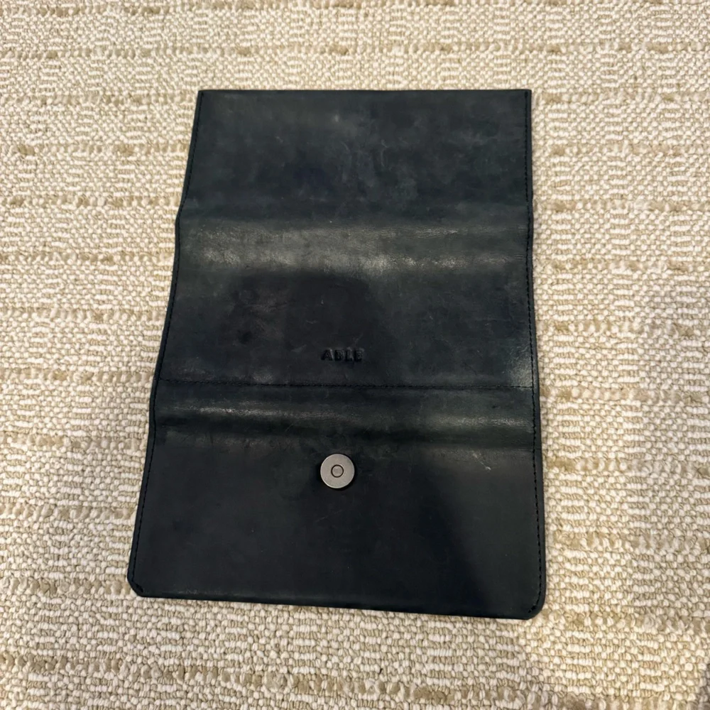 Able black leather