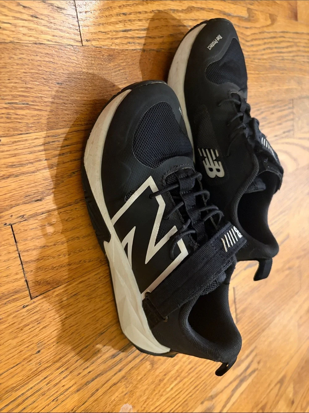 New Balance Boys Black and White Lace-Top Sneakers