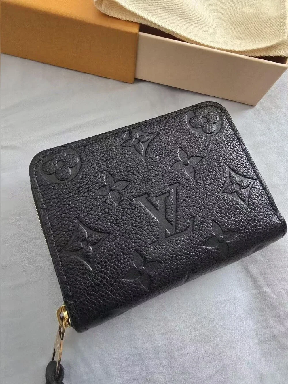 Louis Vuitton zippy coin