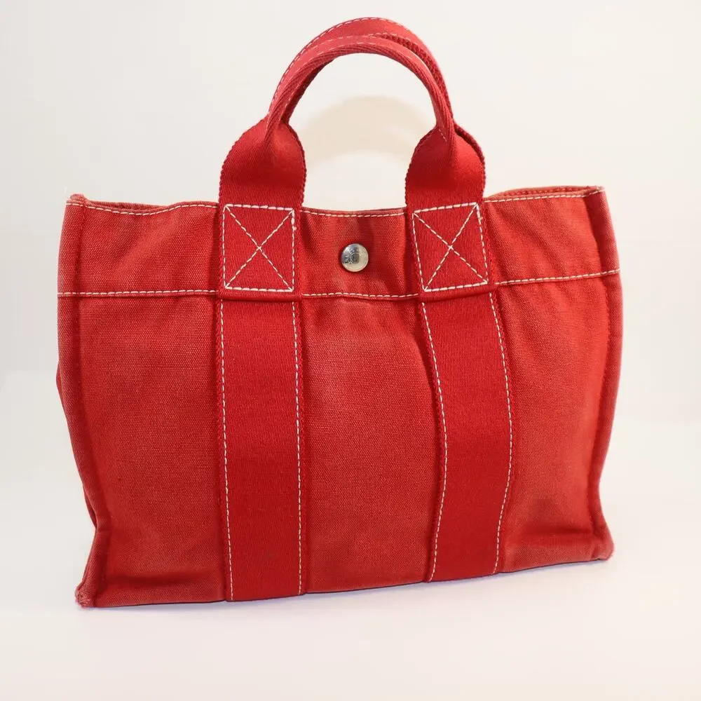 Hermès Red Canvas‎ Small Tote Bag – Classic French Luxury with Snap Closure