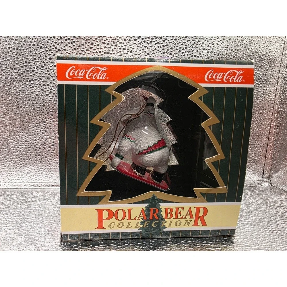 Coca Cola paw figurine year