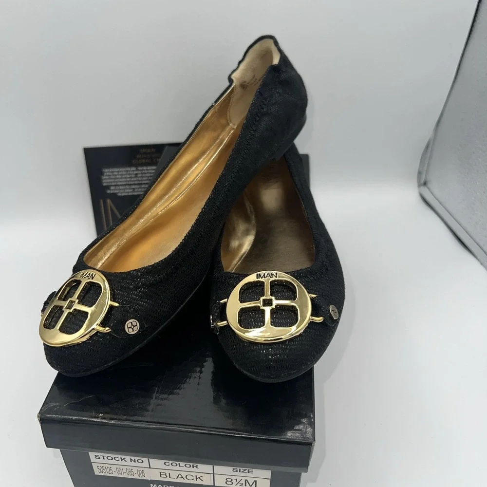 New in box Iman Black Patent Flats Global Chic‎ 8.5 M Signature Gold Logo