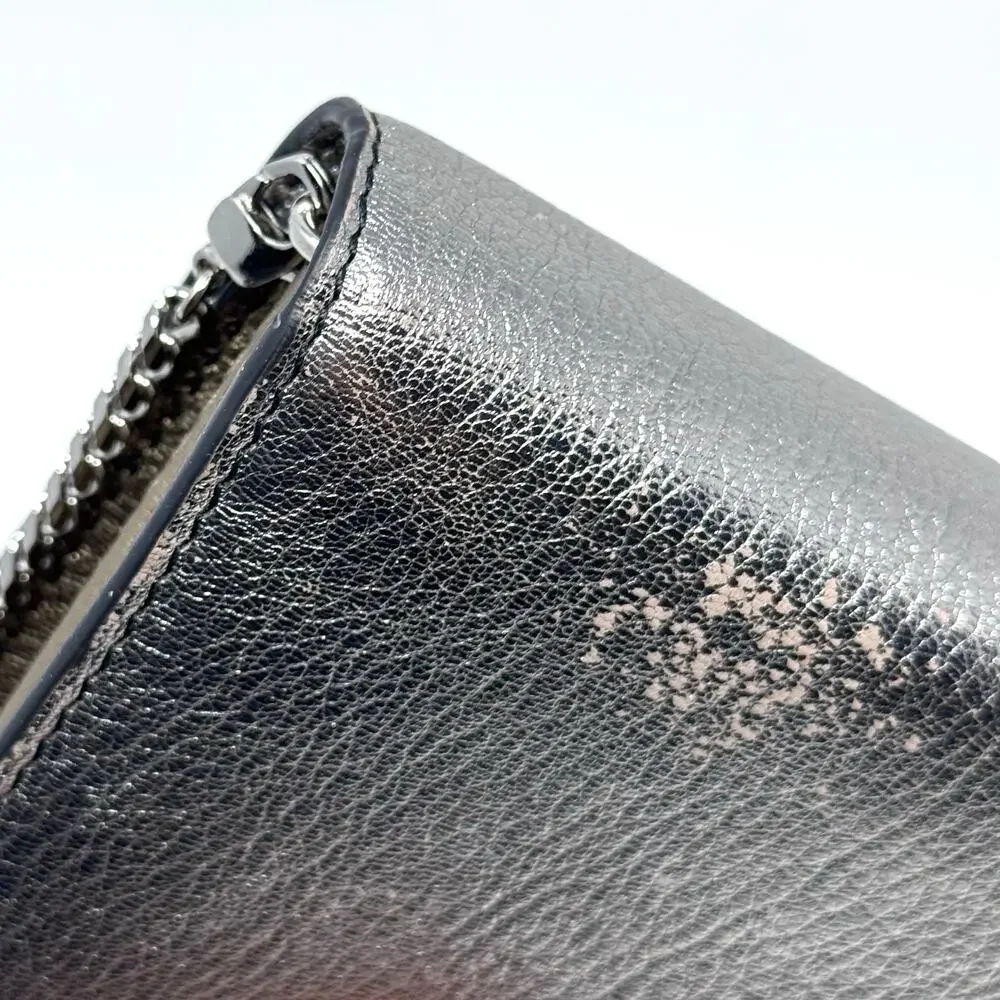 Alexander McQueen all scratched