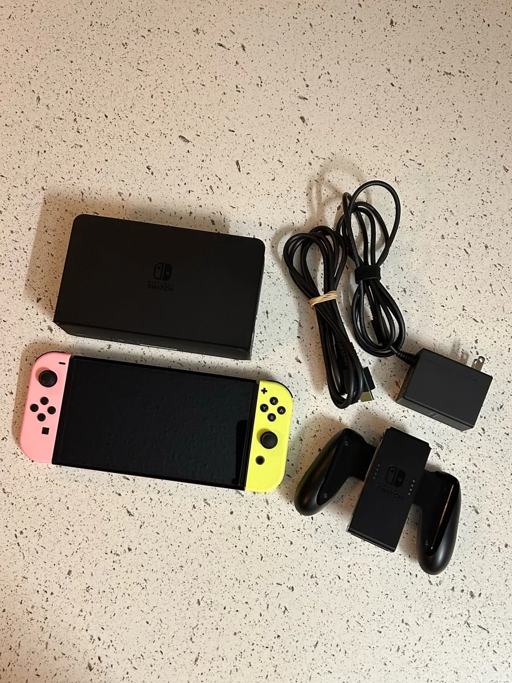 Nintendo Switch with Pastel Pink and Yellow Joycons + Accessories (Preowned)