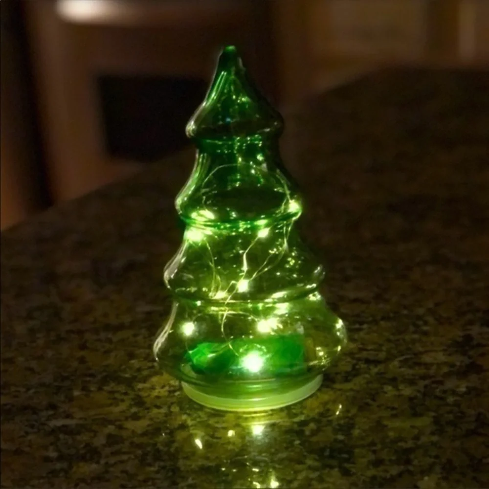 Glass Christmas tree that lights up with fairy lights