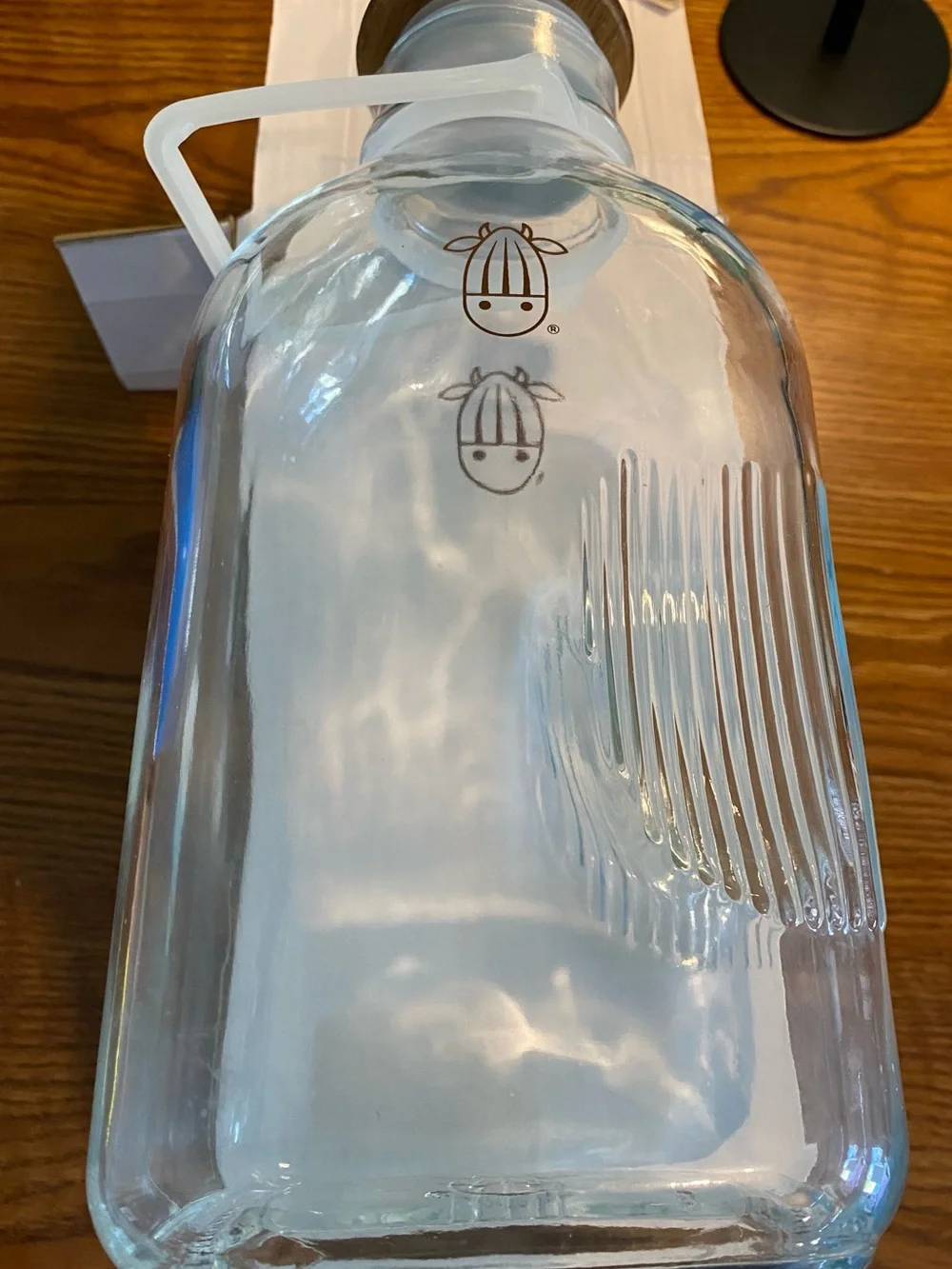 Clear Glass Bottle with Brown Cow Logo - Home Dining Drinkware